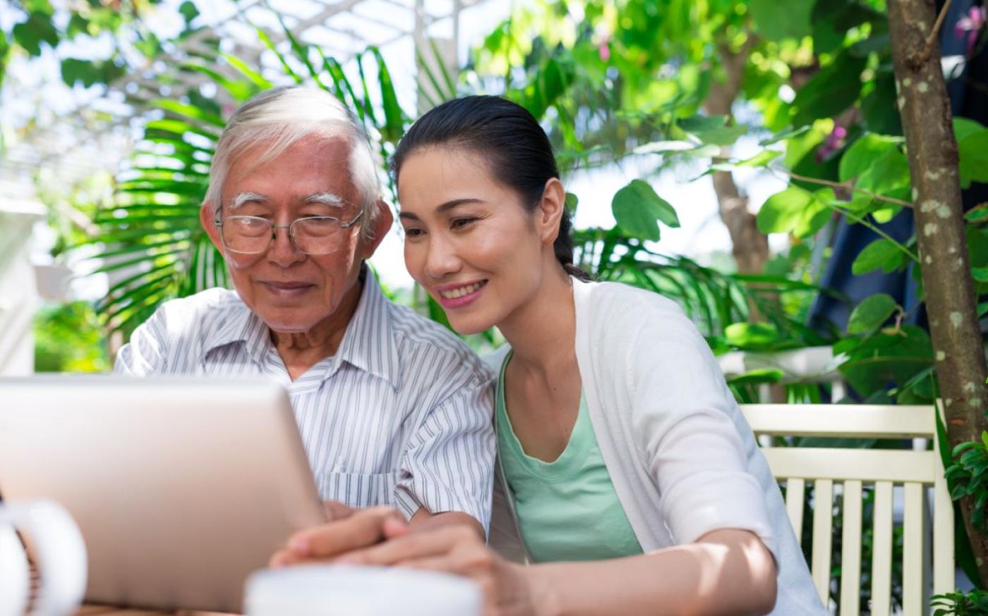 Elderly man and young lady